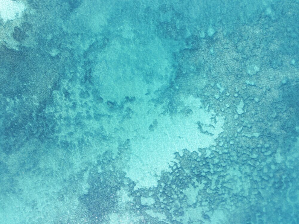 Crystal-clear water over rock