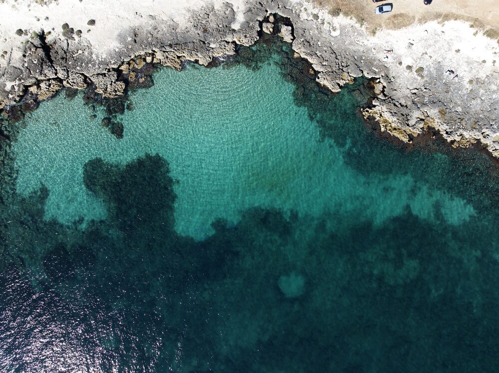 A turquoise cove in the limestone